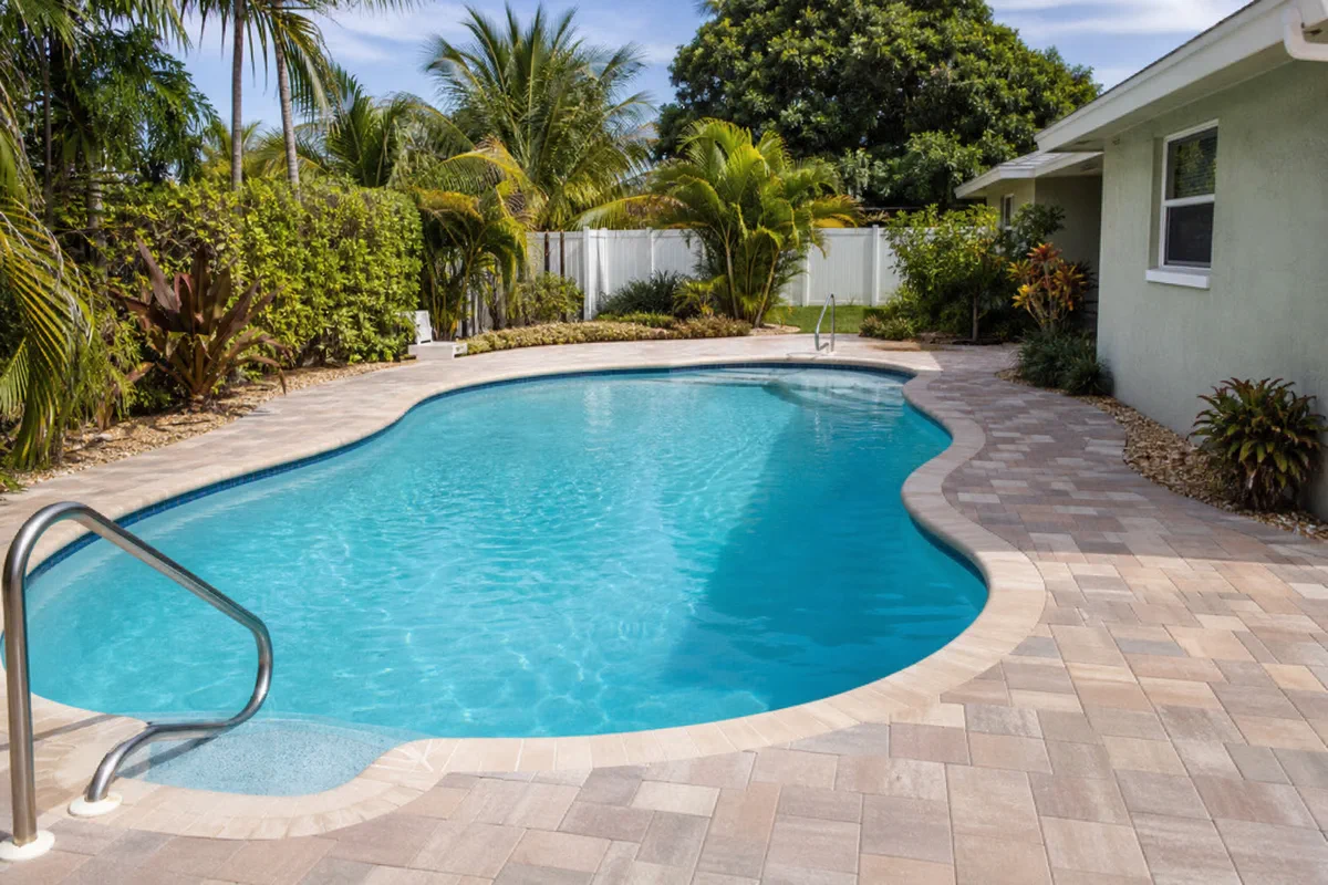 Palm Coast backyard pool surface after leak detection narrows the problem area
